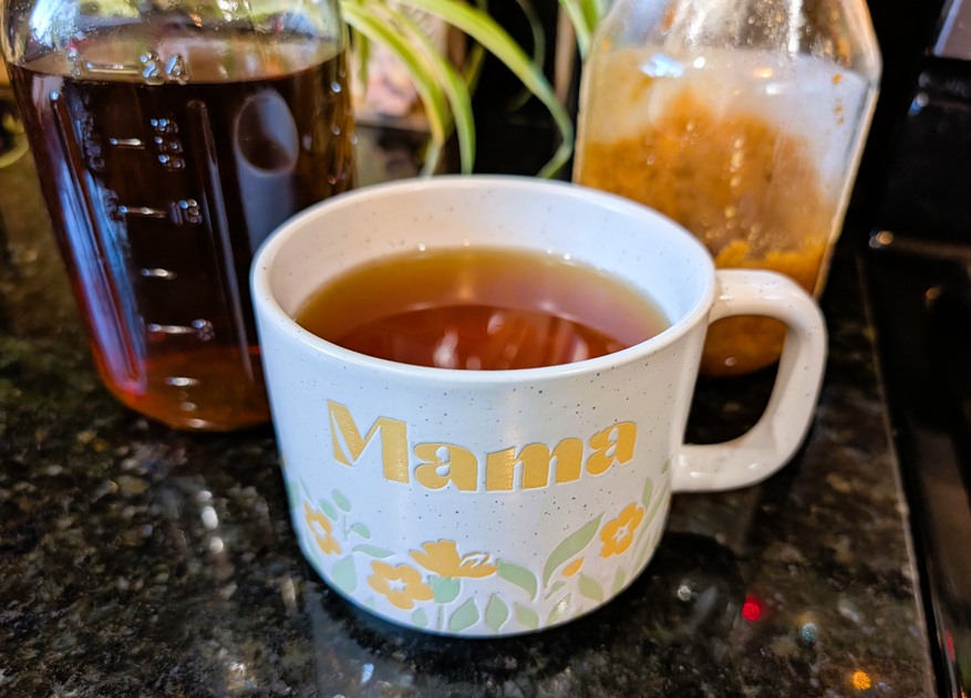 Red raspberry leaf tea in a mug.
